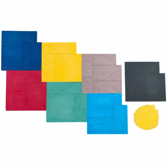 Multicolored Ashlar Slate concrete stamps arranged beside a yellow texture mat