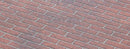 Red facebrick-pattern concrete overlay with staggered rectangular bricks and light gray joint lines