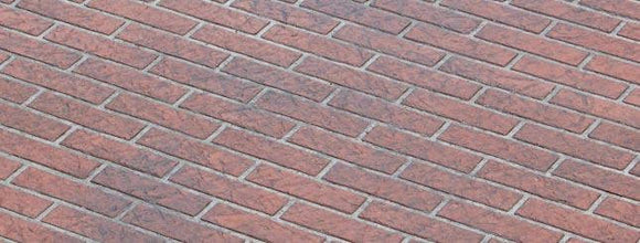 Red facebrick-pattern concrete overlay with staggered rectangular bricks and light gray joint lines
