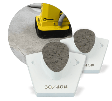 Two white WerkMaster heavy duty metal bond tools with single teardrop segments, marked 30/40 grit, with an inset showing a floor machine on concrete